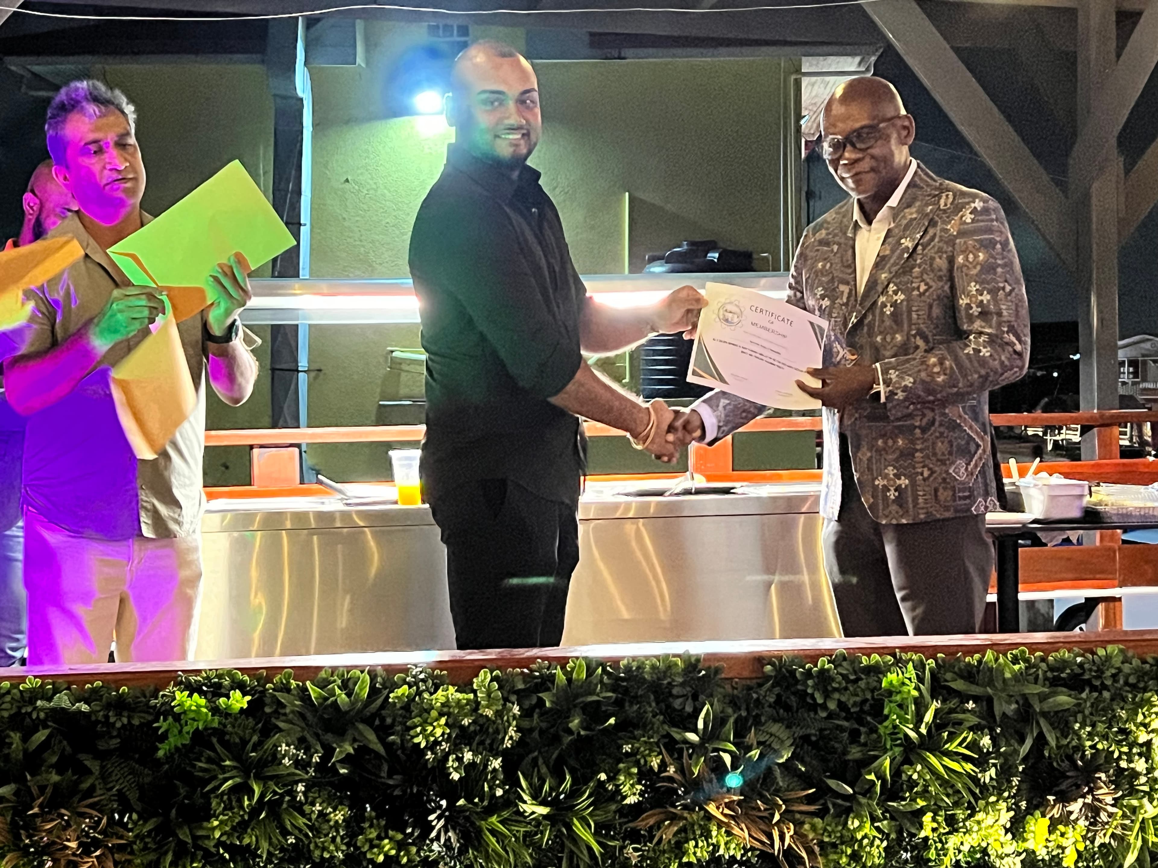 Awarding Membership Certificate to Forrester Group of Companies 