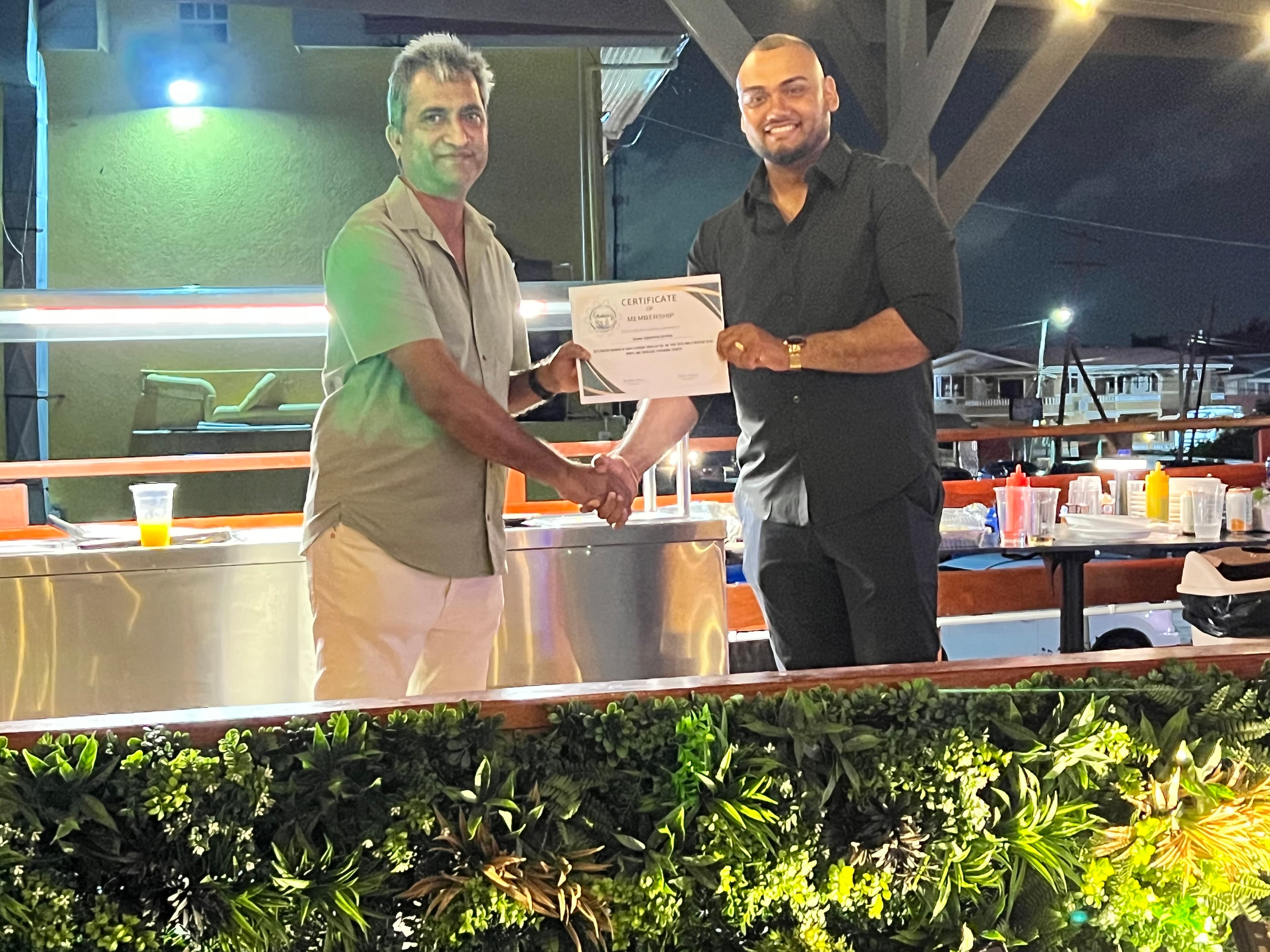 Awarding Membership Certificate to Basdeo Engineering Services 