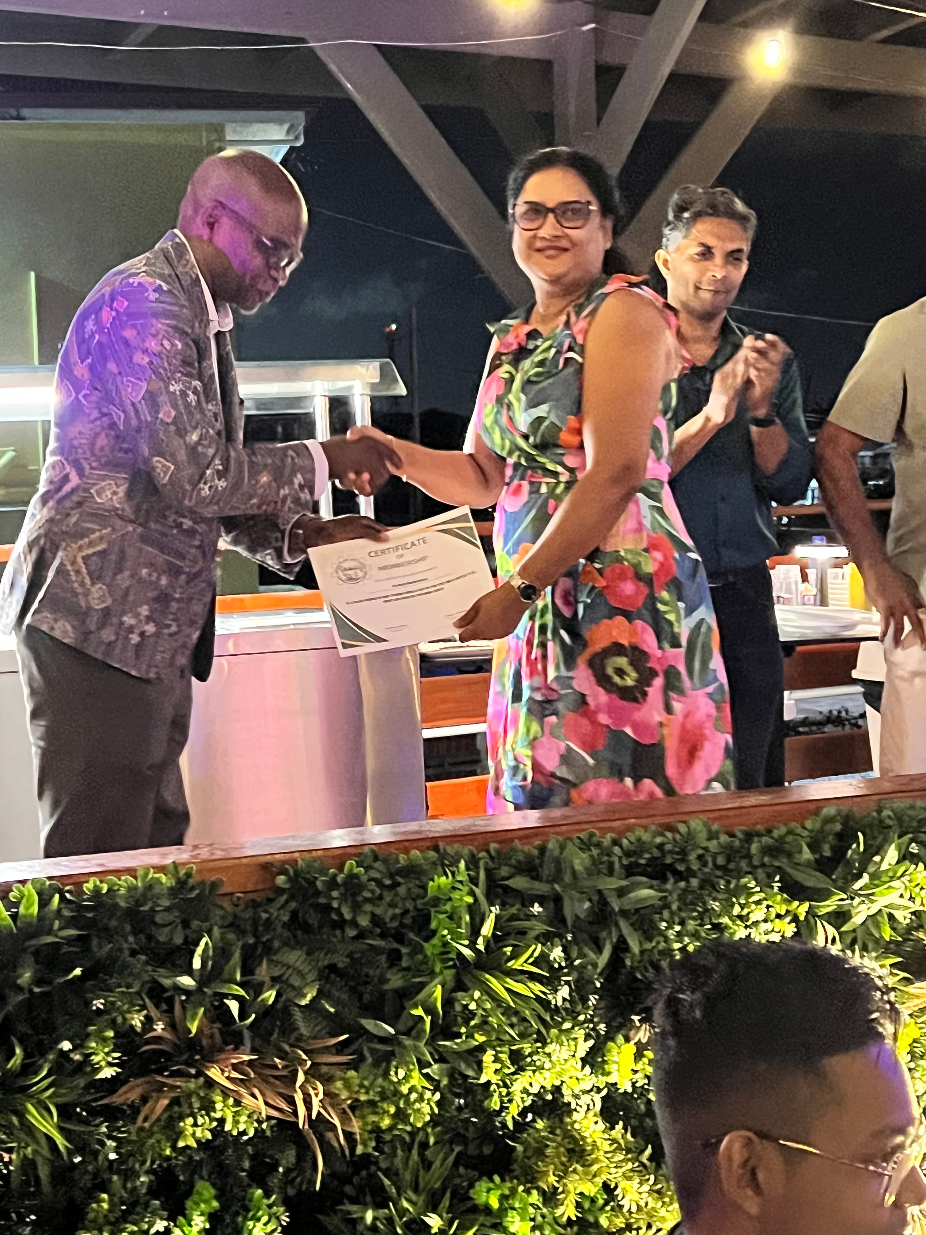 Awarding Membership Certificate to Prestige Manufacturing 