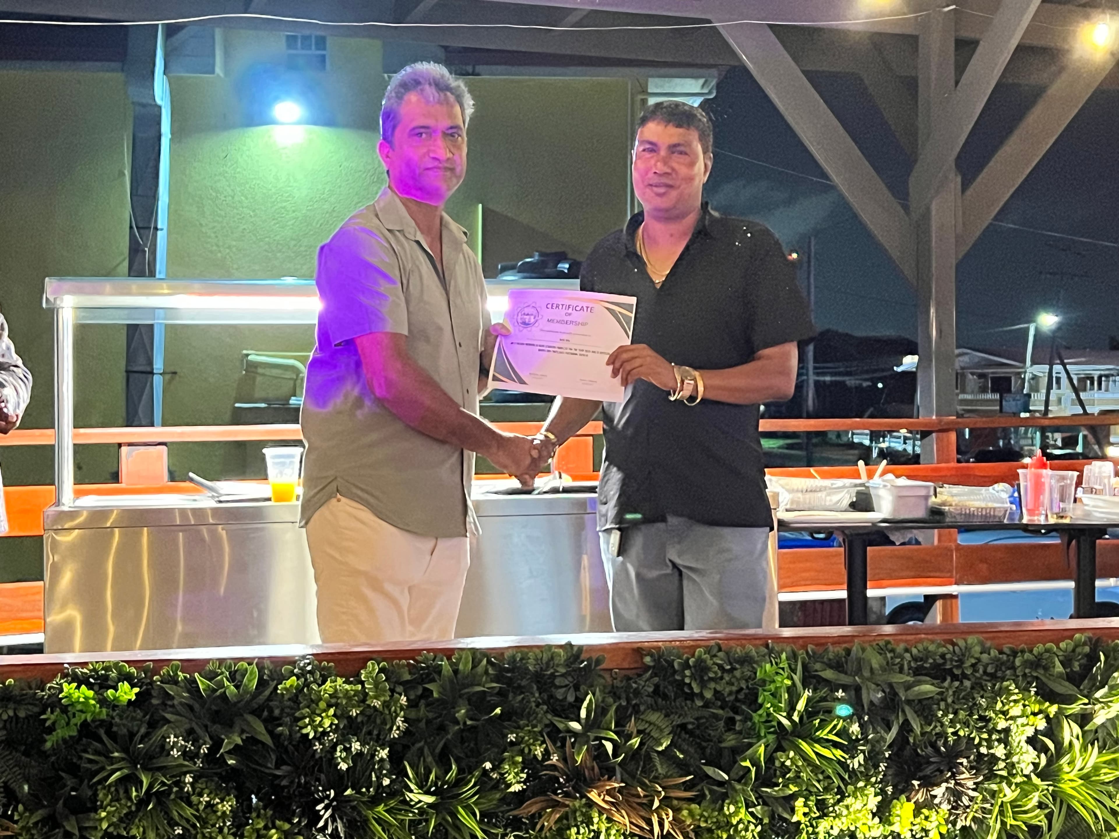 Awarding Membership Certificate to Auto City